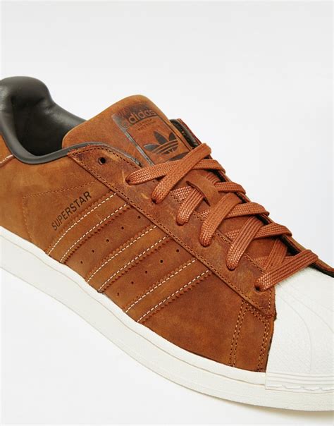 adidas brown leather shoes|adidas with brown bottom.